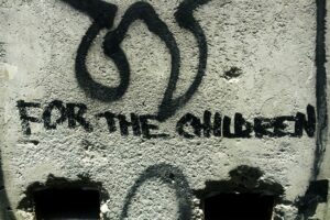 "For the children" text written on wall